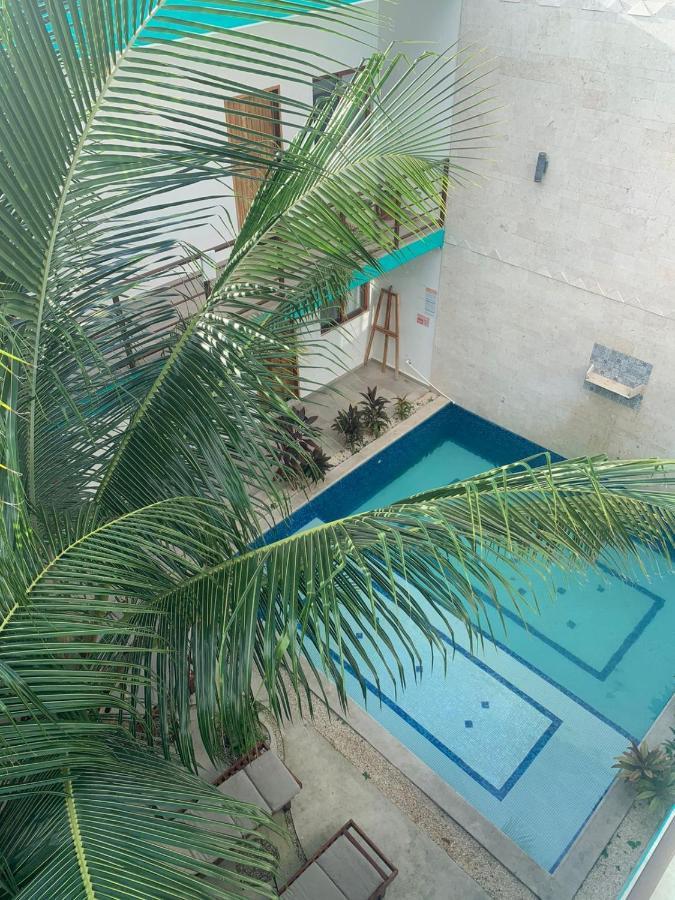 Los Arcos Hotel - Tulum Exterior foto Swimming pool at the hotel