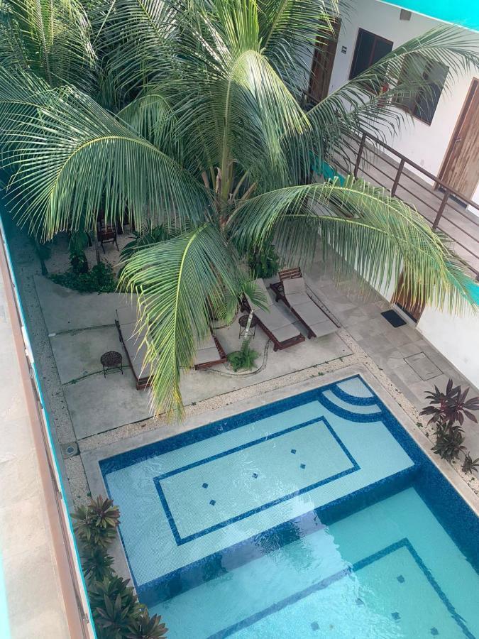 Los Arcos Hotel - Tulum Exterior foto Swimming pool at the hotel